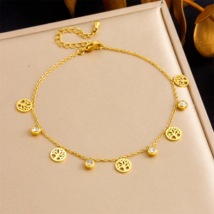 Chaîne de cheville avec pendentif Arbre de Vie en acier inoxydable plaqué or, breloque découpée Arbre de Vie et breloque ronde en cristal, pour femmes, idéale pour les vacances - Product Image 1