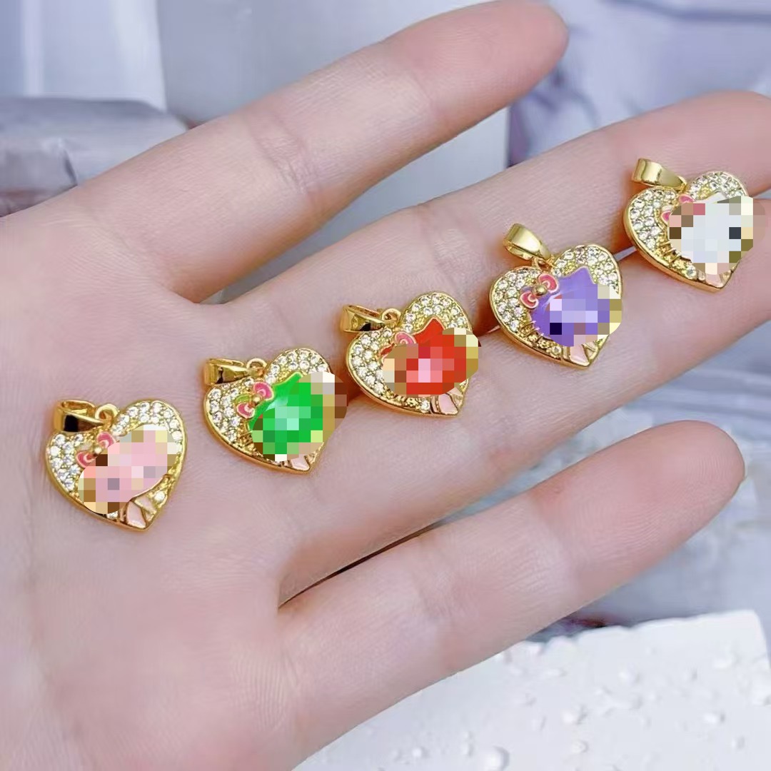 14k gold plated hollow kitty pendant