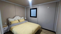 Maison conteneur en acier extensible à double aile de 20 et 40 pieds de haute qualité avec panneau sandwich au design moderne pour le camping et le bureau de chantier