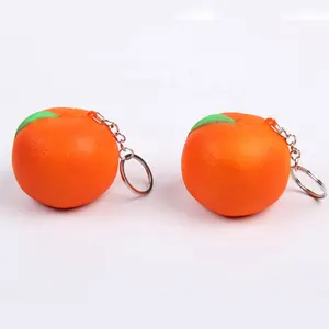 קצף Pu רך מכירה חמה באיכות גבוהה צורת תפוז מחזיק מפתחות כדור מתח לוגו מותאם אישית שרשרת מפתחות פירות