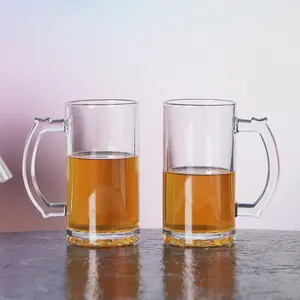 A caneca de cerveja de vidro vazia transparente de 16 onças e 500 ml de alta qualidade mais popular com alça