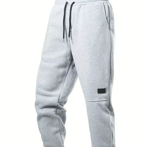 Dropshipping Joggers casuales de color sólido para hombre con bolsillos, pantalones con cordón para deporte y ropa informal - Product Image 1
