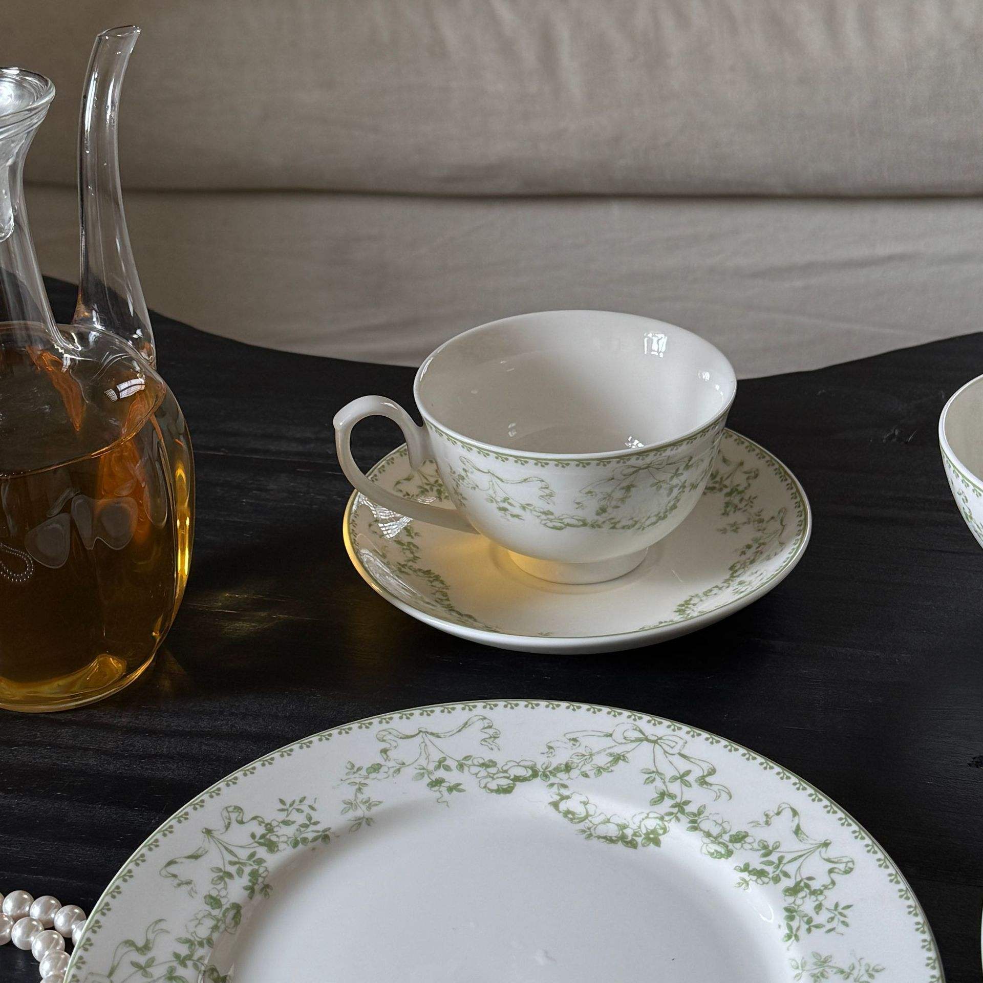 Tender green cups and plates