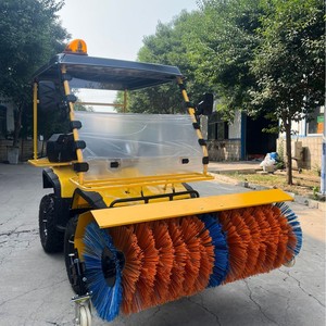 Machine à neige à essence avec brosse rotative multifonctionnelle jaune pour le déneigement des routes - Product Image 1