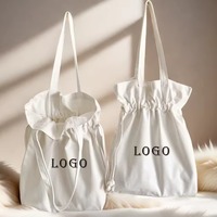 Vente en gros de toile vierge en coton à poignée recyclée écologique pour femmes sac à cordon d'épaule avec poignée en corde