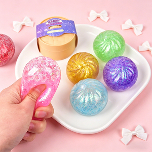 Mini bolas antiestrés de colores en forma de dumpling - Product Image 1