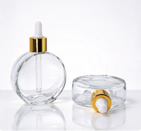 Flacon compte-gouttes rond en verre transparent vide de 20 ml pour sérum, huile capillaire ou huile essentielle, avec logo personnalisé, sérigraphié et estampé or