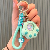 Porte-clés PVC Lumineux Créatif Patte de Chat Effet Coucher de Soleil pour Voiture et Sac à Dos