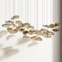 Lustre LED circulaire suspendu en fer et verre pour salon minimaliste, restaurant, couloir, ambiance artistique et design transfrontalier