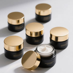 高品質の金のふたのガラスの瓶50g 100g 150gの黒いガラスのクリーム色の金のアルミふた付き - Product Image 1