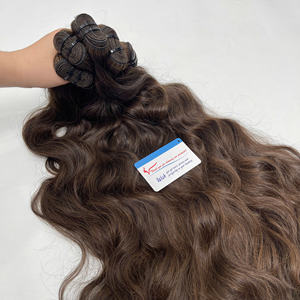 Extensiones de cabello humano en bruto vietnamita, paquete de cabello de trama ondulada natural, estilo de encaje de alta calidad, precio al por mayor de fábrica, tipo a granel - Product Image 1