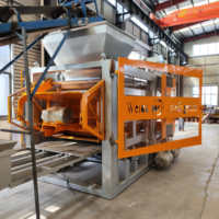 Grande capacité de production QT10-15 machine de pose de briques hydraulique entièrement automatique pour pavé bloc creux usine