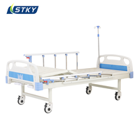 Lit médical manuel à 2 fonctions, lit d'hôpital à double manivelle, cadre en acier, lit de soins infirmiers avec garde-corps en alliage d'aluminium et roulettes silencieuses