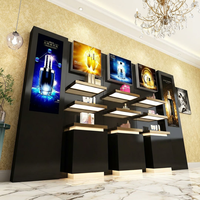 Vitrine cosmétique noire et or sur mesure avec éclairage LED, murale, pour présentation de soins de la peau et de parfums, pour les boutiques de beauté
