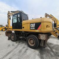 En stock, excavatrice sur pneus d'occasion CAT M320D2 de 19,5 tonnes, excavatrice sur pneus Caterpillar d'occasion à vendre