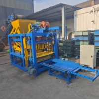 Ligne de production de blocs entièrement automatique, machine à briques colorées avec système de contrôle avancé pour la fabrication de briques commerciales