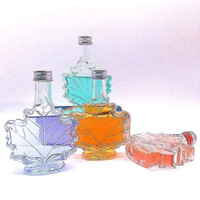 Botol minum kaca, bentuk daun Maple mewah 50ml 100ml botol kosong anggur bening dengan tutup aluminium untuk minuman alkohol