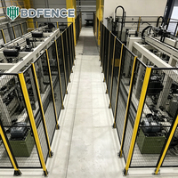 Barrière de sécurité modulaire pour machines en acier à faible teneur en carbone avec panneaux à dégagement rapide et accès de service facilité pour zone de travail robotisée