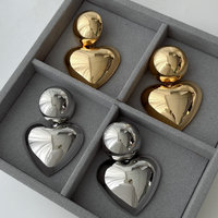 2025 accessoire d'oreille chunky le plus populaire finition miroir or et argent liaison ronde avec boucles d'oreilles en forme de coeur