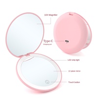 Miroir cosmétique LED portable, design pliable double face, lumière intégrée, rechargeable par USB, compact, portable, grossissement 10x