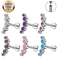 Vente en gros de bijoux de piercing corporel tendance en titane ASTM F136 plaqué or, certifiés IGI, avec grappe de 3 pierres CZ serties à l'intérieur et à la façon de la pierre.