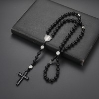 Nouveau collier chapelet religieux catholique pour homme en pierre volcanique noire, avec croix originale en pierre et pendentif Saint Benoît
