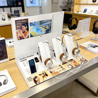 Support d'affichage pour casque en acrylique personnalisé avec écran LCD, verrouillage de sécurité, comptoir d'affichage de démonstration audio pour la vente au détail