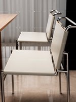 Chaise de salle à manger italienne minimaliste en acier inoxydable et cuir, design moderne, mobile, imperméable, pour la maison et l'hôtel