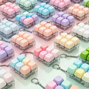 31 Diseños Mini Teclado Fidget Toy Llaveros Redondos con Teclas Antiestrés para Niños y Adultos - Product Image 4