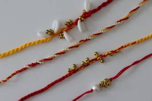 Vente en gros de bijoux religieux Exima, bijoux faits à la main, style bohème, perles colorées en coton tressé, perles d'eau douce de 4 mm, Rakhi pour femmes - Product Image 2