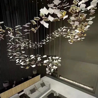 Lustre d'intérieur d'hôtel de luxe moderne avec la lampe pendante carrée de feuille en céramique personnalisable par l'usine pour des décorations de villa