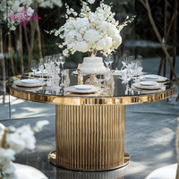 Table à gâteaux ronde moderne en acier inoxydable doré pour le salon ou la salle à manger de mariage en plein air d'hôtel