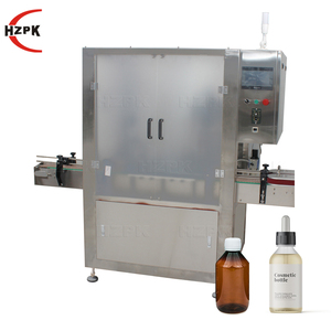 Machine de remplissage et de bouchage automatique HZPK pour flacons ronds en plastique et en verre de 10 ml, 15 ml, 20 ml, 30 ml, 50 ml pour parfums - Product Image 1