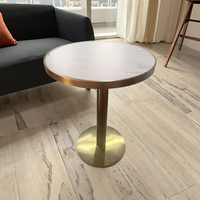 Table basse ronde moderne avec dessus en marbre et cadre en métal Table basse de salon élégante