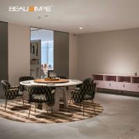 Table à manger ronde Arches, table de dîner de luxe italienne en marbre Karacatta avec plateau tournant en noyer et base en marbre pour salle à manger de villa