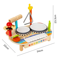 Table d'activités musicales en bois certifiée pour enfants, jouet sensoriel multi-instruments avec piano, tambours, cymbales et triangle, favorise le rythme