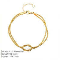 Nouveau Bracelet Unisexe Tendance Européen et Américain en Acier Inoxydable, Motif Os de Serpent Noué, avec Cœur Doré et Chaîne Infinie, de Marque Tierce