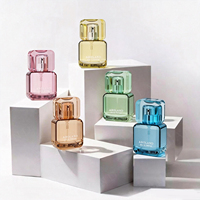 Flacon de parfum en verre de luxe au design spécial 30ml 50ml 100ml avec pompe, revêtement de couleur personnalisable, emballage haut de gamme avec boîte