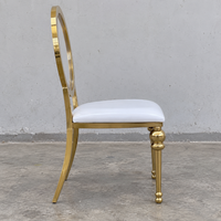 Chaise de banquet de mariage en acier inoxydable doré avec pieds tournés et dossier creux, vente en gros