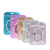 Emballage laser, étanche à l'humidité, estampage à chaud, pochette transparente colorée, sacs à fermeture éclair scintillants pour bijoux et montres