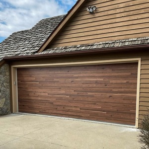 <span class=keywords><strong>Porte</strong></span> de <span class=keywords><strong>garage</strong></span> <span class=keywords><strong>motorisée</strong></span> en aluminium sur mesure <span class=keywords><strong>avec</strong></span> surface en <span class=keywords><strong>bois</strong></span> grainé ou ondulée - Product Image 1
