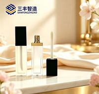 Tube à lèvres vide en plastique noir mat avec dessus doré, forme carrée et applicateur large, pour cosmétiques