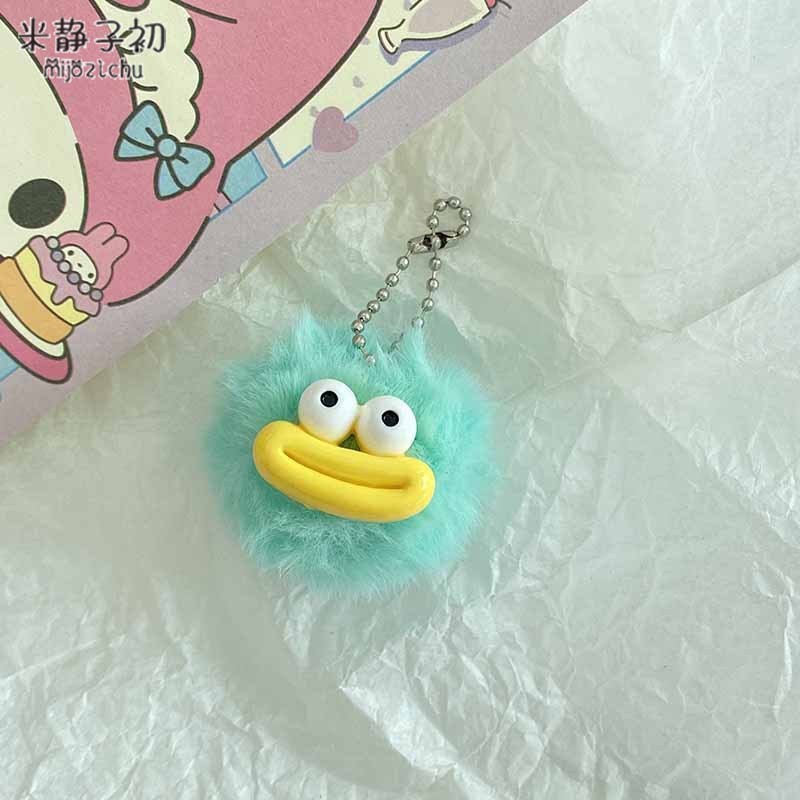 Porte-clés pompon bouche de saucisse bleu clair