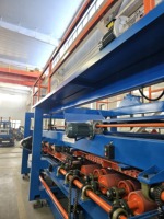 Machine automatique pour panneaux sandwich en laine de roche et EPS