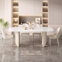 Table à manger de luxe de conception italienne avec plateau en pierre frittée Pandora Art et base en panneau crème pour meubles de projet de villa.