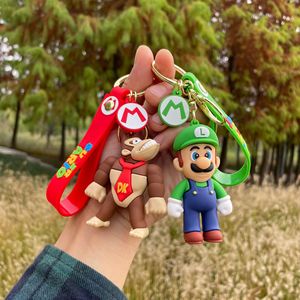Venta al por mayor de alta calidad <span class=keywords><strong>Super</strong></span> Bros Mario dibujos animados Mario lindo burbuja dragón Mario muñeca coche encanto accesorios llaveros - Product Image 2