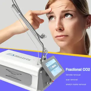 Online training support portable co2 fractional laser vaginal handles vaginal rejuvenation acne scar treatment machine with CE