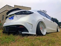 Convient pour Mazda 3 Axela berline quatre portes. Améliorez le kit carrosserie avec le pare-chocs arrière style KS. Remplacer le becquet arrière de la voiture.