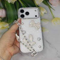 Coque de téléphone antichoc avec nœud 3D en strass et dragonne en perles pour iPhone X 11 12 13 15 16 17 Samsung S26
