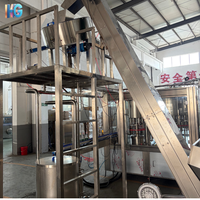 Machine de remplissage automatique efficace, système d'embouteillage fiable pour l'usine de remplissage d'eau minérale en bouteille PET